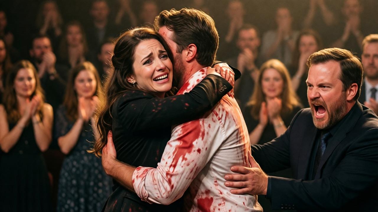 A highly emotional, cinematic reunion scene on stage. A well-dressed woman, Claire, her face contorted with a mix of shock, joy, and grief, is embracing Daniel tightly. He is still covered in red paint, which is now smearing onto her elegant clothes, but she doesn't care. The audience in the background is a blur of standing, applauding figures, some wiping their eyes. In the foreground, security is escorting a furious, booed Richard off the premises. The lighting is warm and forgiving, focusing on the central embrace. The mood is one of overwhelming catharsis and redemption.